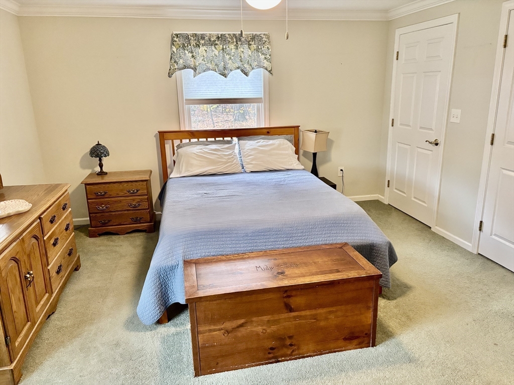 43 Wishing Well Way West Springfield, MA 01089 - Photo 21 of 42 a bedroom with a bed and cabinets