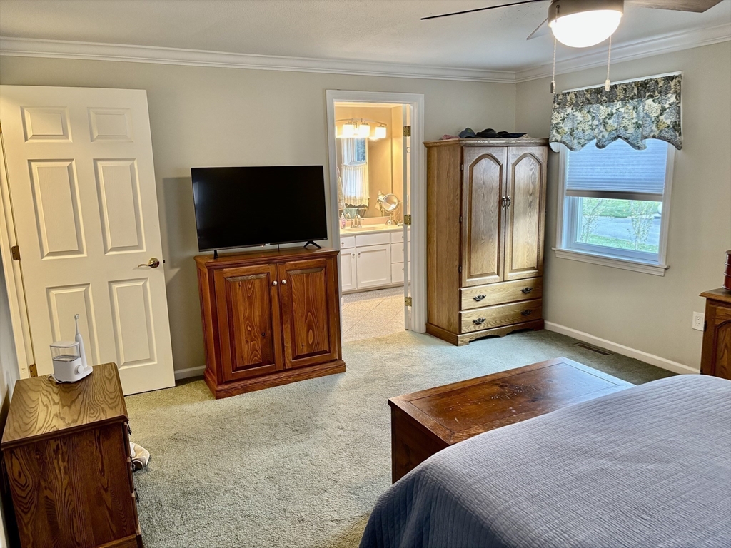 43 Wishing Well Way West Springfield, MA 01089 - Photo 24 of 42 a bedroom with furniture and a flat screen tv