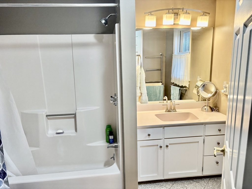 43 Wishing Well Way West Springfield, MA 01089 - Photo 25 of 42 a bathroom with a sink and a mirror