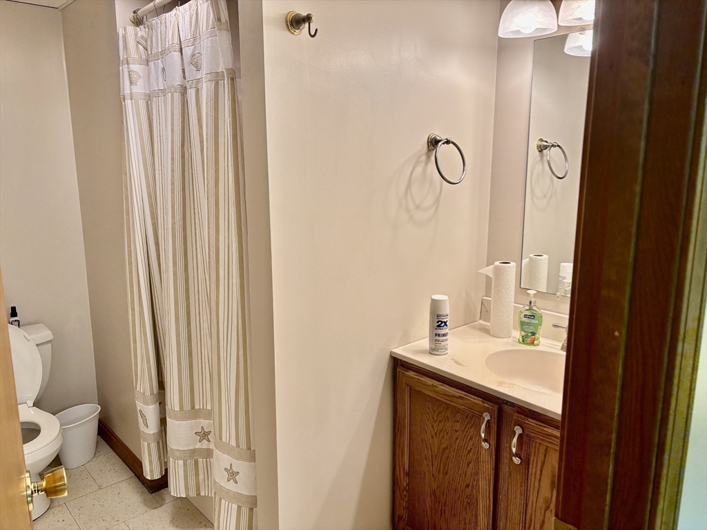 43 Wishing Well Way West Springfield, MA 01089 - Photo 36 of 42 a bathroom with a sink vanity and a mirror