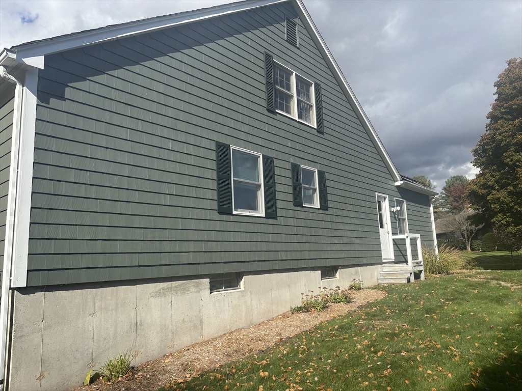 43 Wishing Well Way West Springfield, MA 01089 - Photo 7 of 42 a front view of a house with a yard