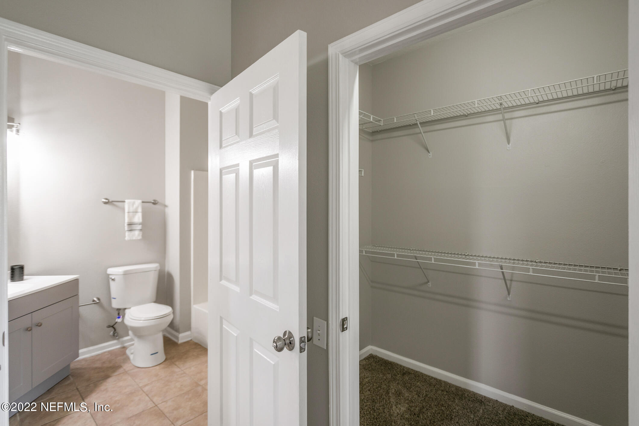 7990 Baymeadows Road, Unit 303 Jacksonville, FL 32256 - Photo 11 of 40 a bathroom with a toilet and a shower