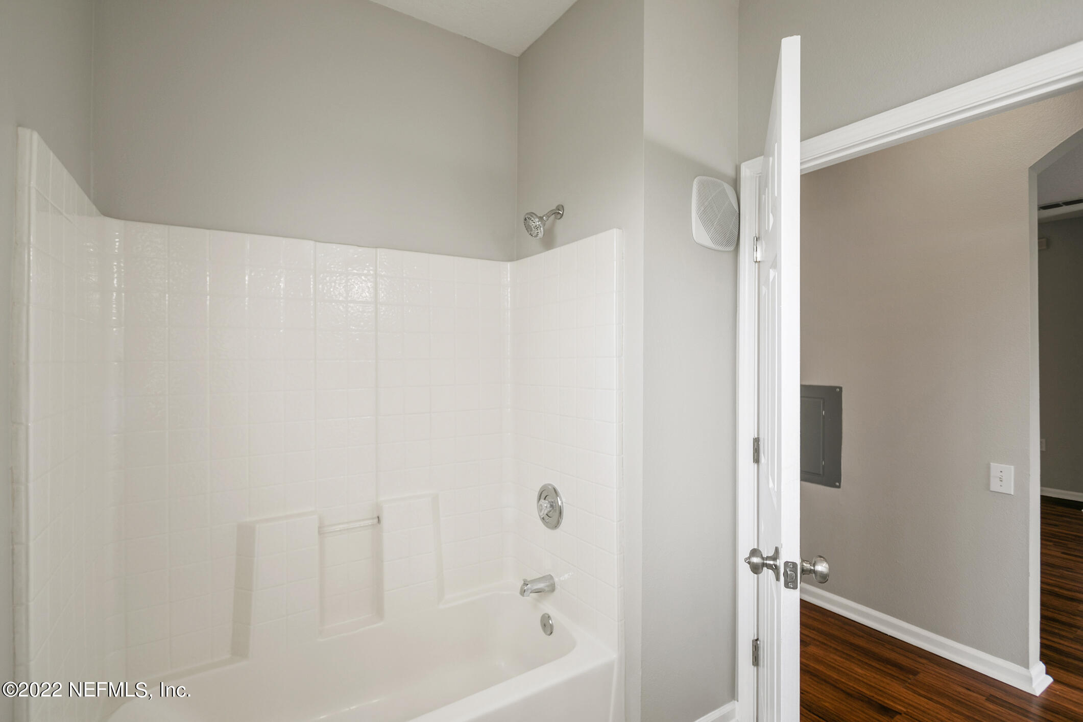 7990 Baymeadows Road, Unit 303 Jacksonville, FL 32256 - Photo 16 of 40 a bathroom with a shower and a tub