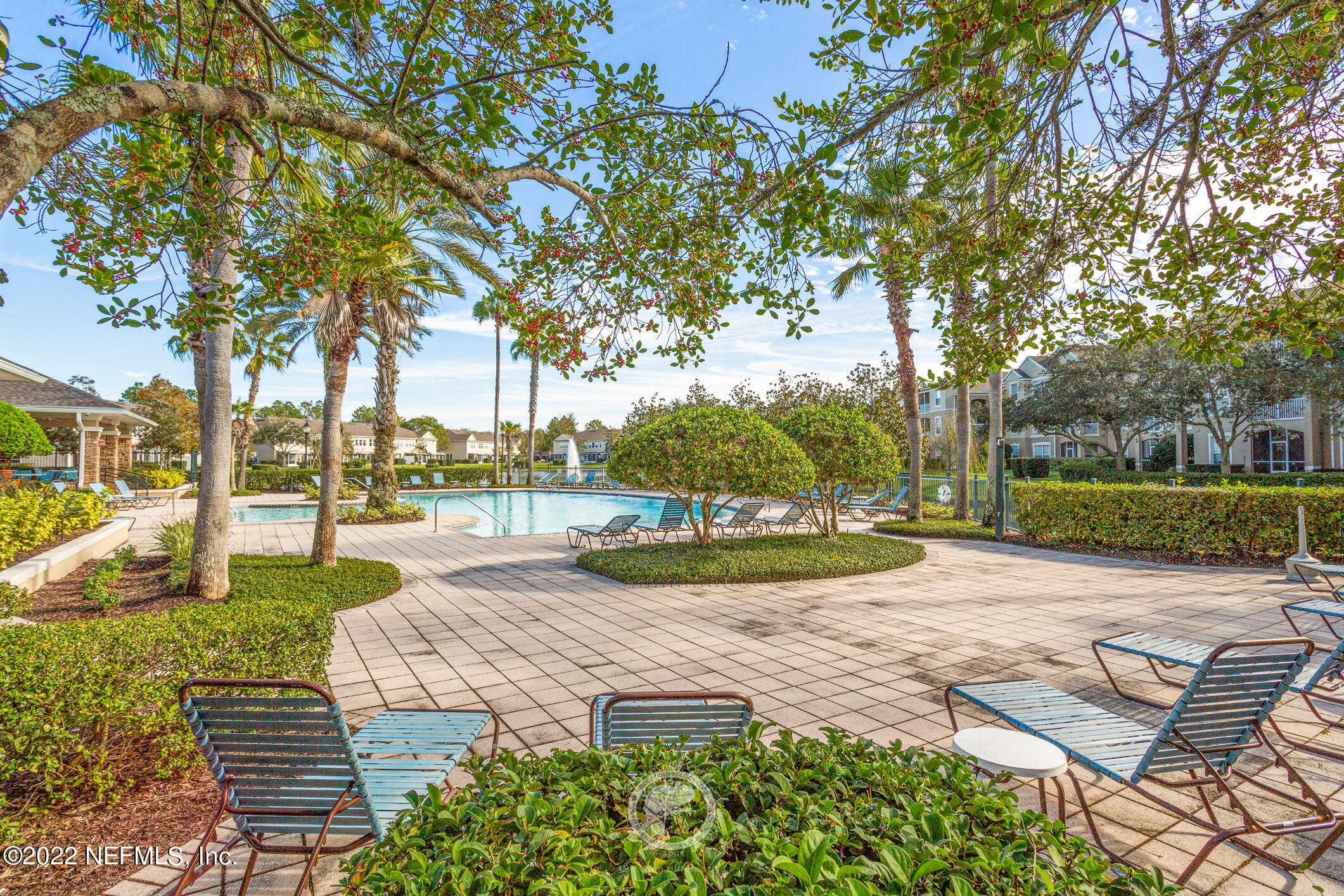 7990 Baymeadows Road, Unit 303 Jacksonville, FL 32256 - Photo 32 of 40 a view of a yard with plants and trees
