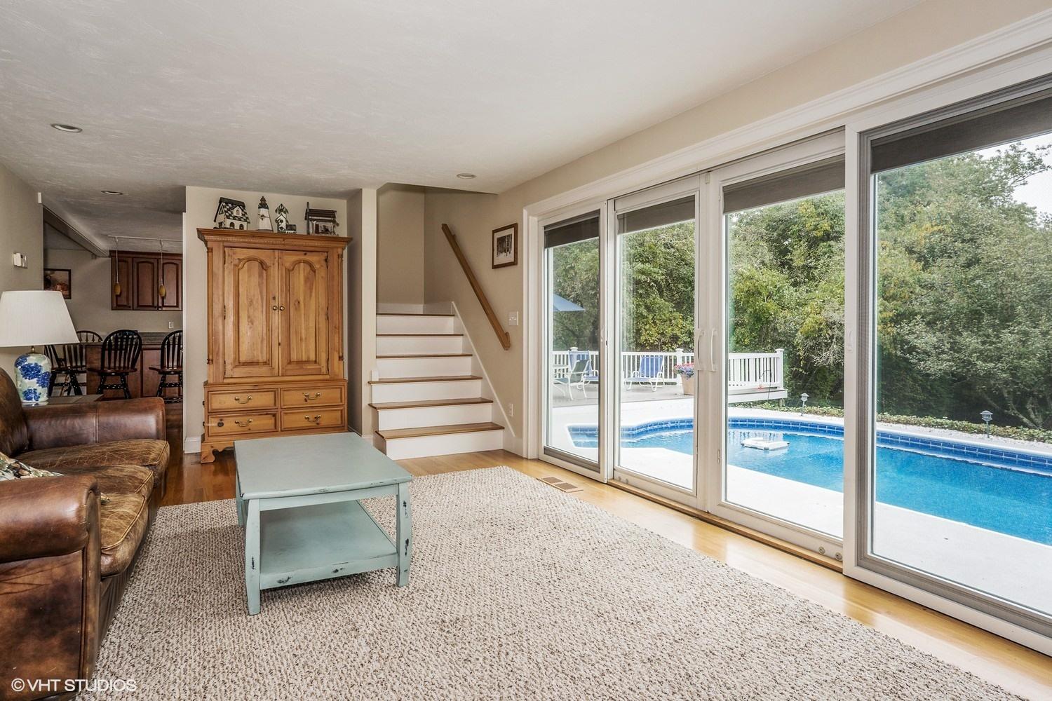 20 Lords Pond Road Chatham, MA 02650 - Photo 4 of 28 a living room with furniture and a floor to ceiling window