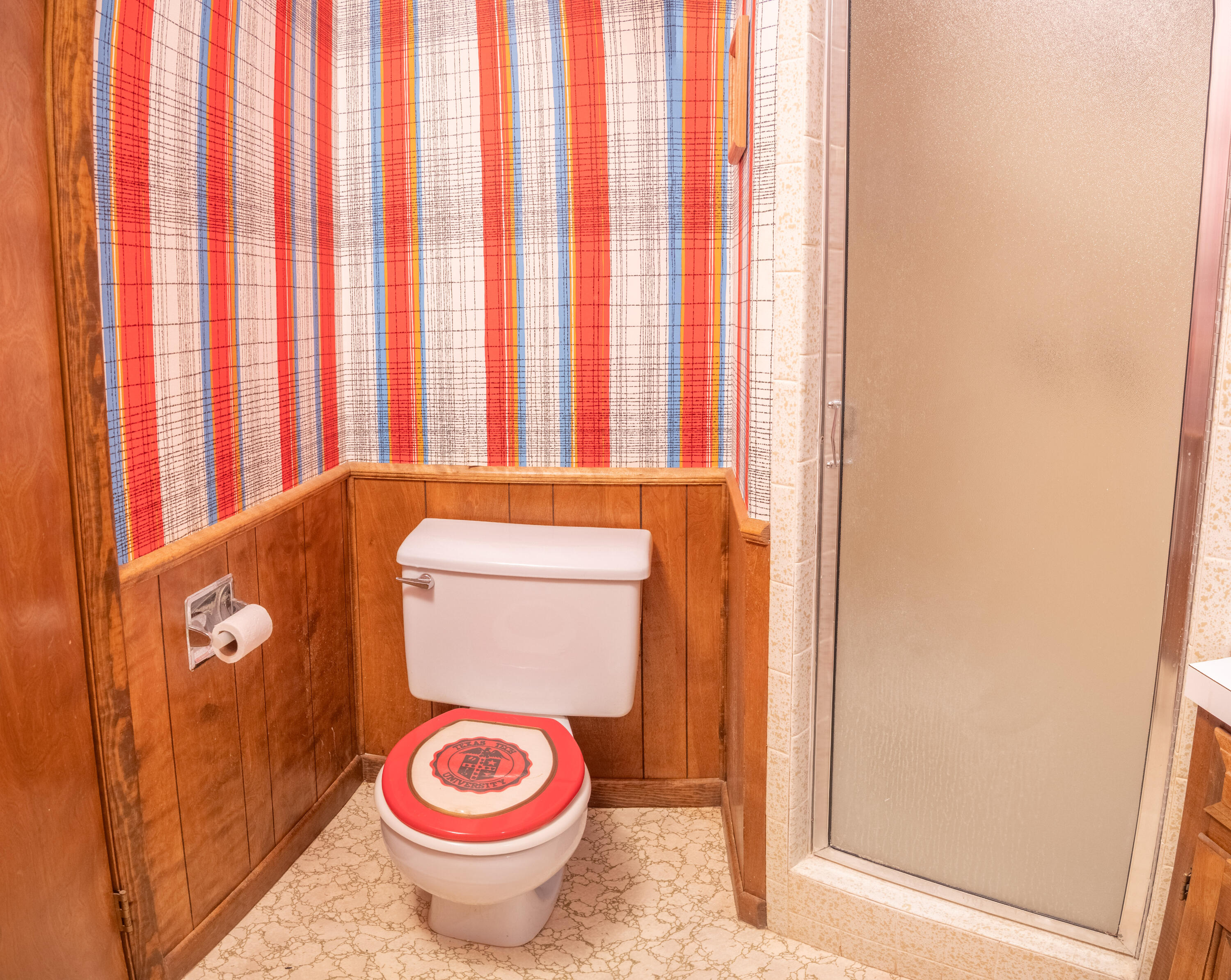 303 Comanche Trail Tulia, TX 79088 - Photo 23 of 37 a bathroom with a toilet and a sink
