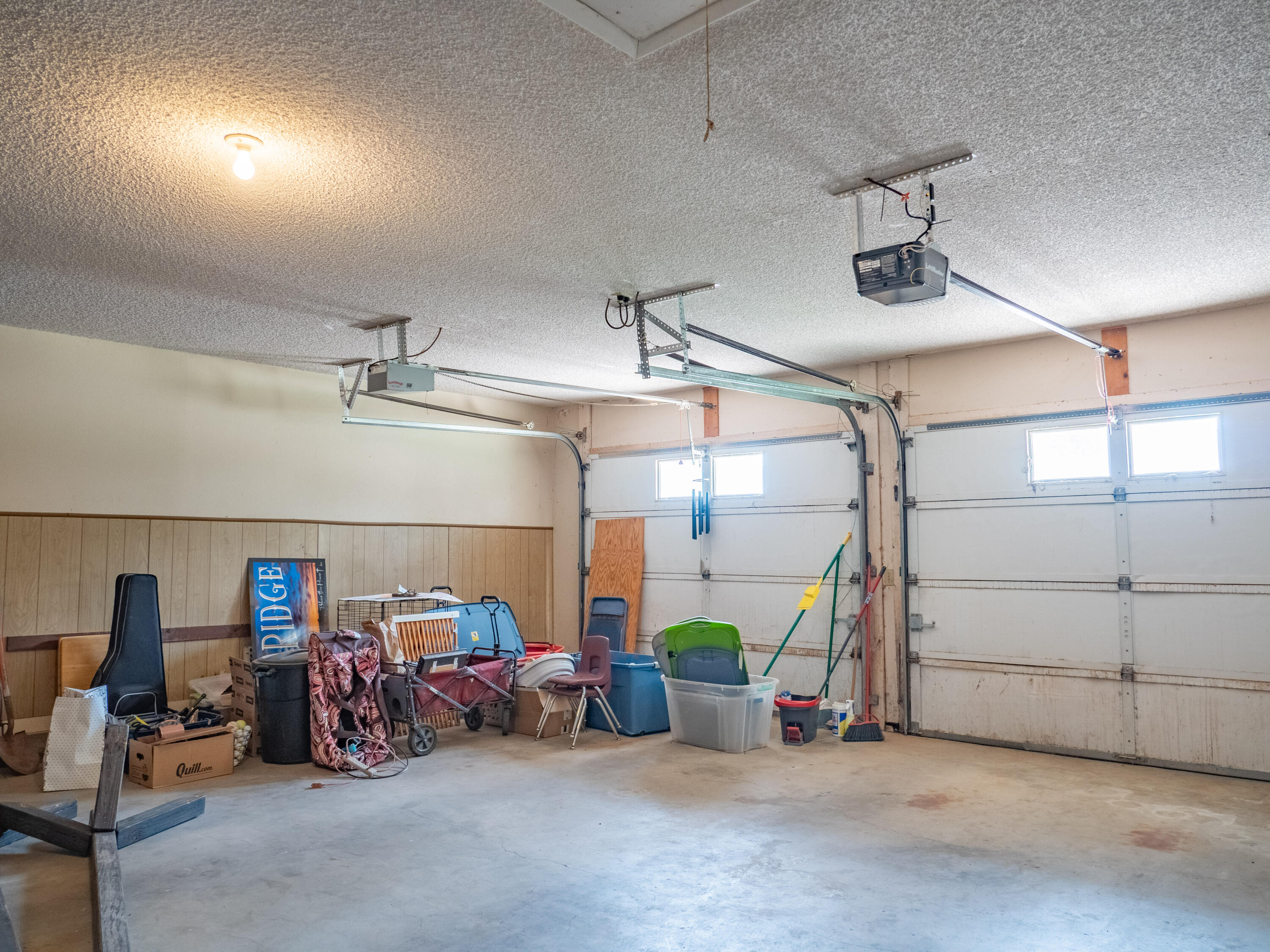 303 Comanche Trail Tulia, TX 79088 - Photo 30 of 37 a view of a garage with rack and bicycle