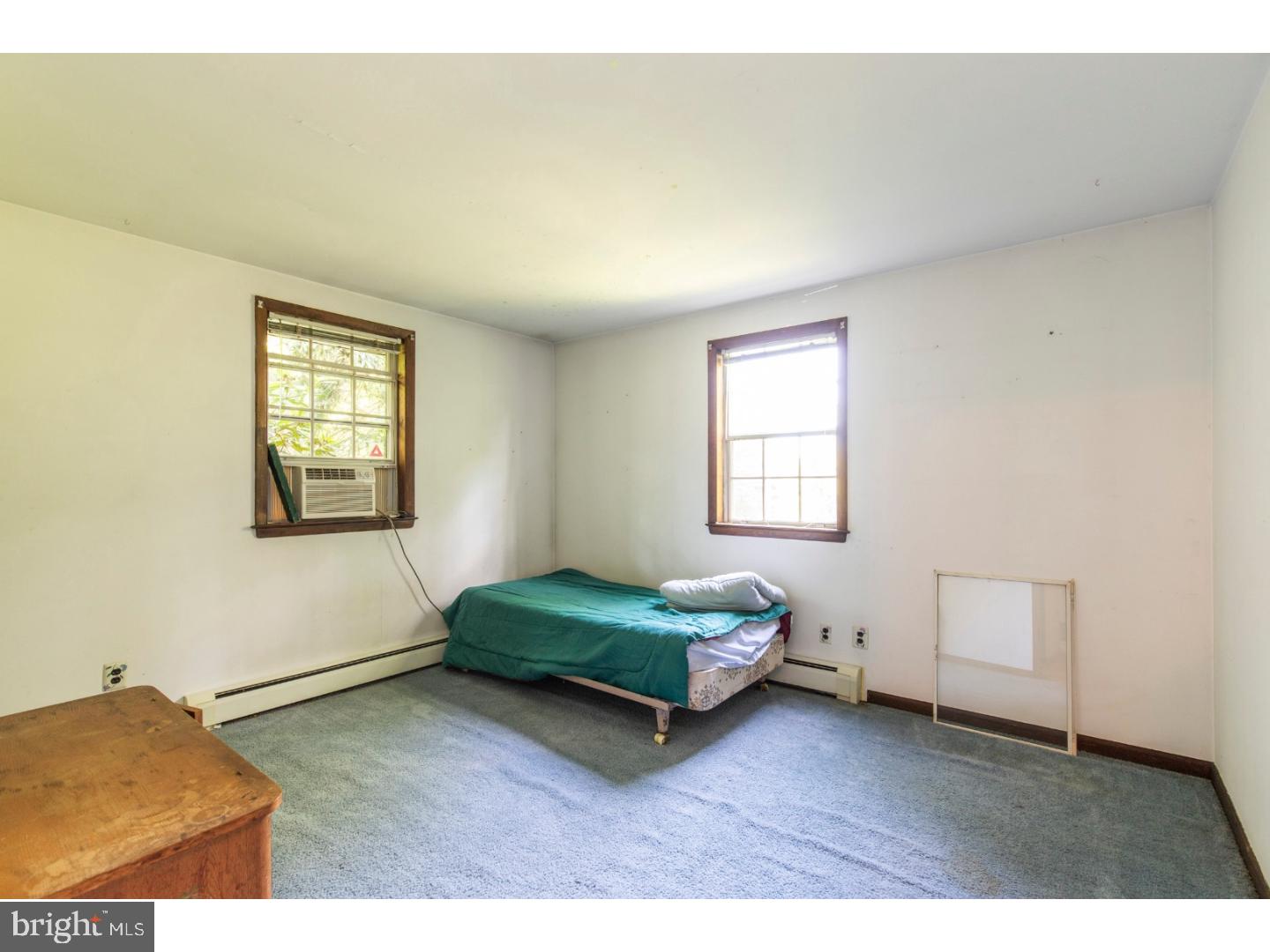 108 Peacedale Road Landenberg, PA 19350 - Photo 13 of 25 a spacious bedroom with a bed and a window