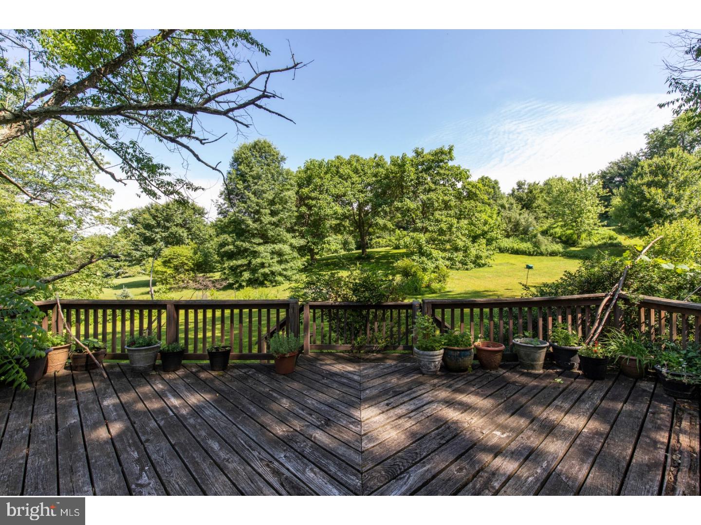 108 Peacedale Road Landenberg, PA 19350 - Photo 18 of 25 a view of balcony with wooden floor and outdoor seating