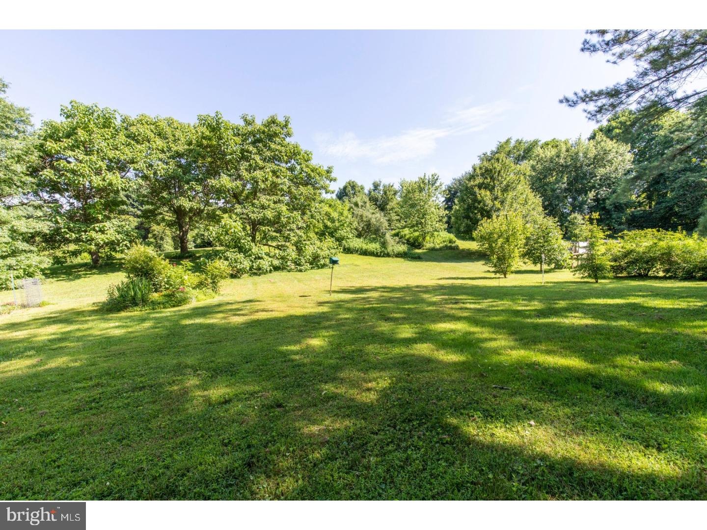 108 Peacedale Road Landenberg, PA 19350 - Photo 21 of 25 a backyard of a house with a yard and outdoor seating