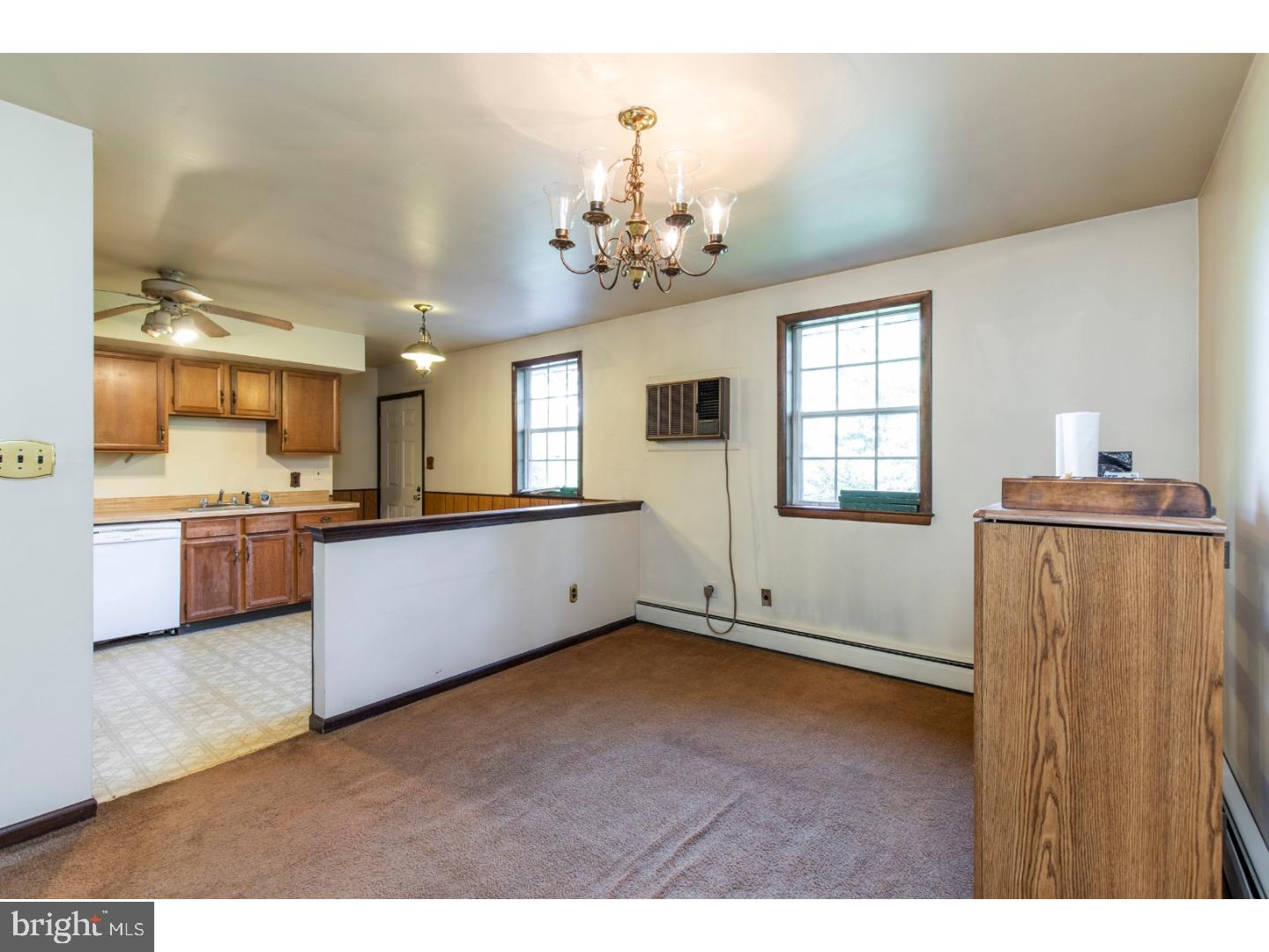 108 Peacedale Road Landenberg, PA 19350 - Photo 4 of 25 a view of a kitchen with kitchen island wooden floors and stainless steel appliances