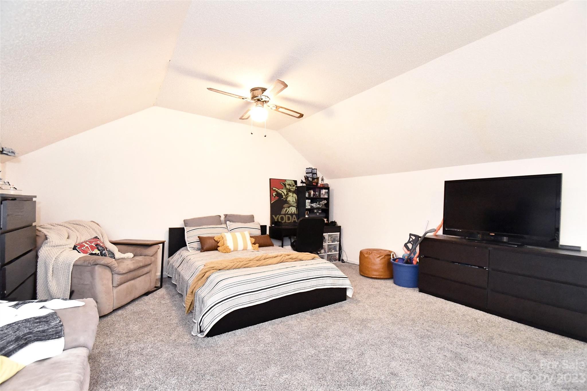 8017 Tottenham Drive Harrisburg, NC 28075 - Photo 26 of 36 a bedroom with bed and tv
