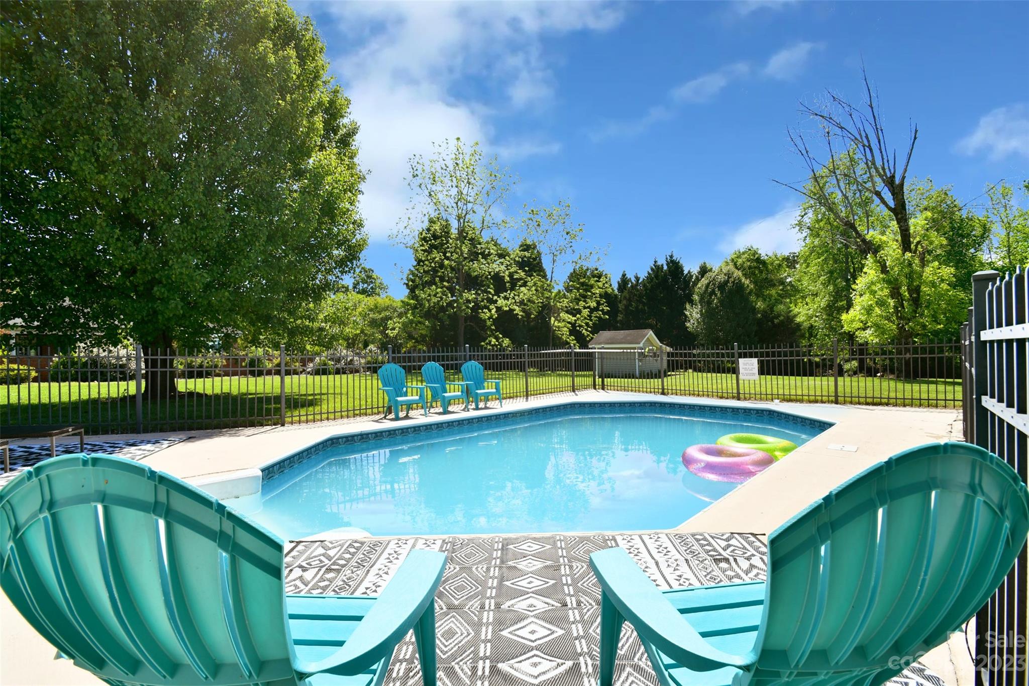 8017 Tottenham Drive Harrisburg, NC 28075 - Photo 30 of 36 a view of a swimming pool with lounge chair