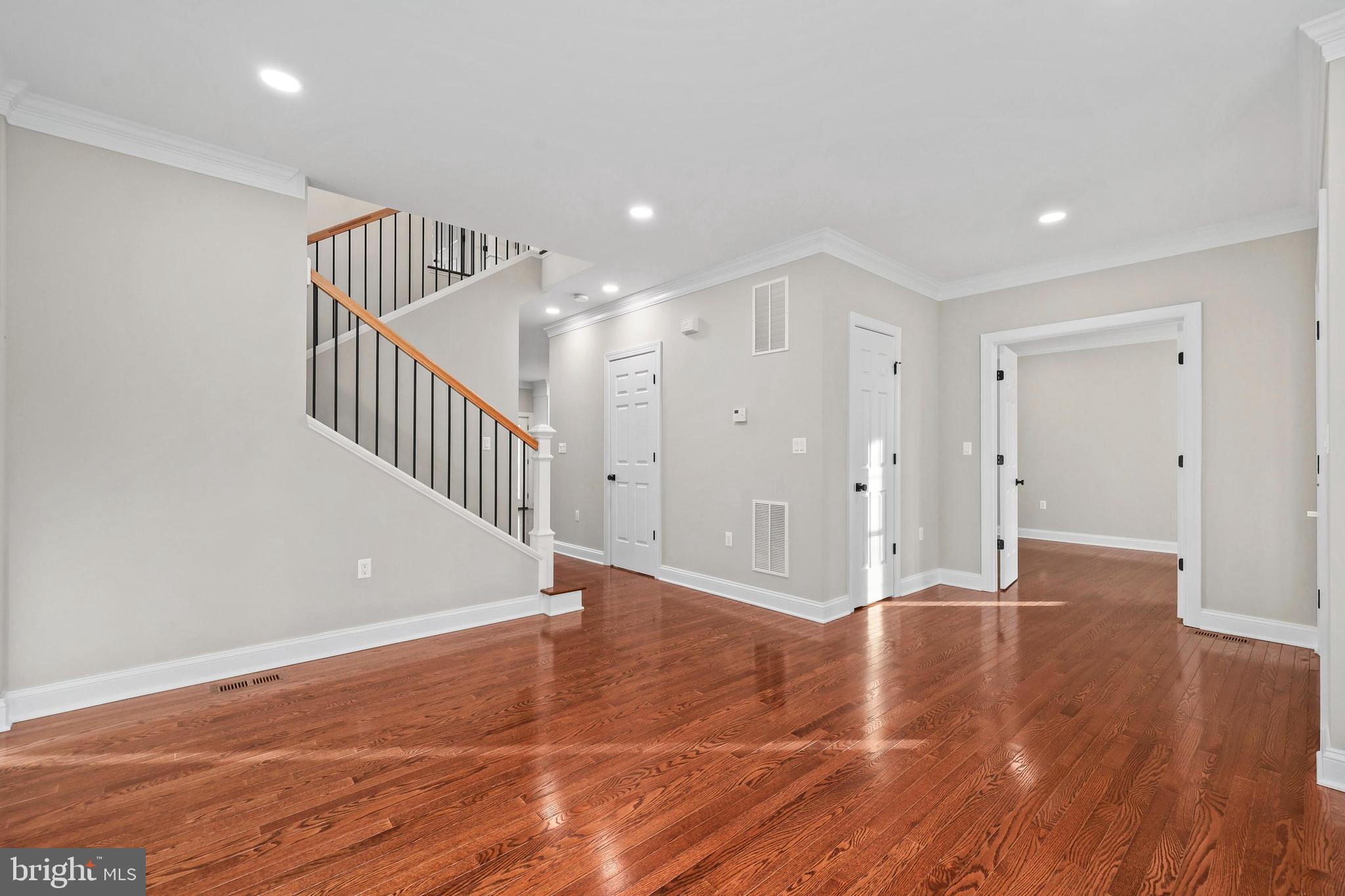 5393 Merry Oaks Road The Plains, VA 20198 - Photo 13 of 58 a view of an empty room with wooden floor