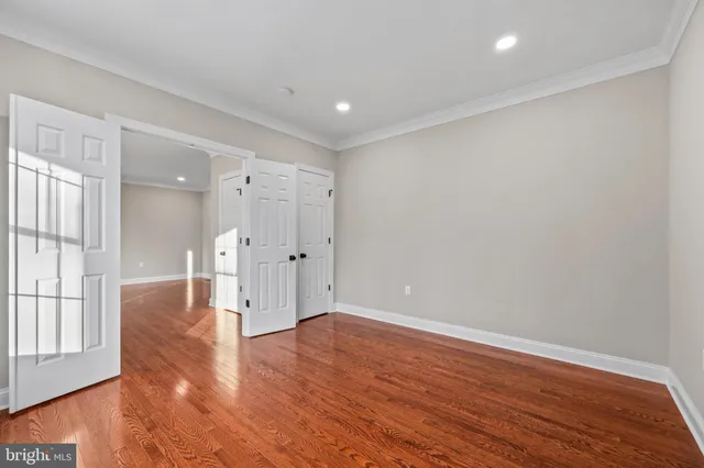 a bathroom with a sink a mirror and a shower
