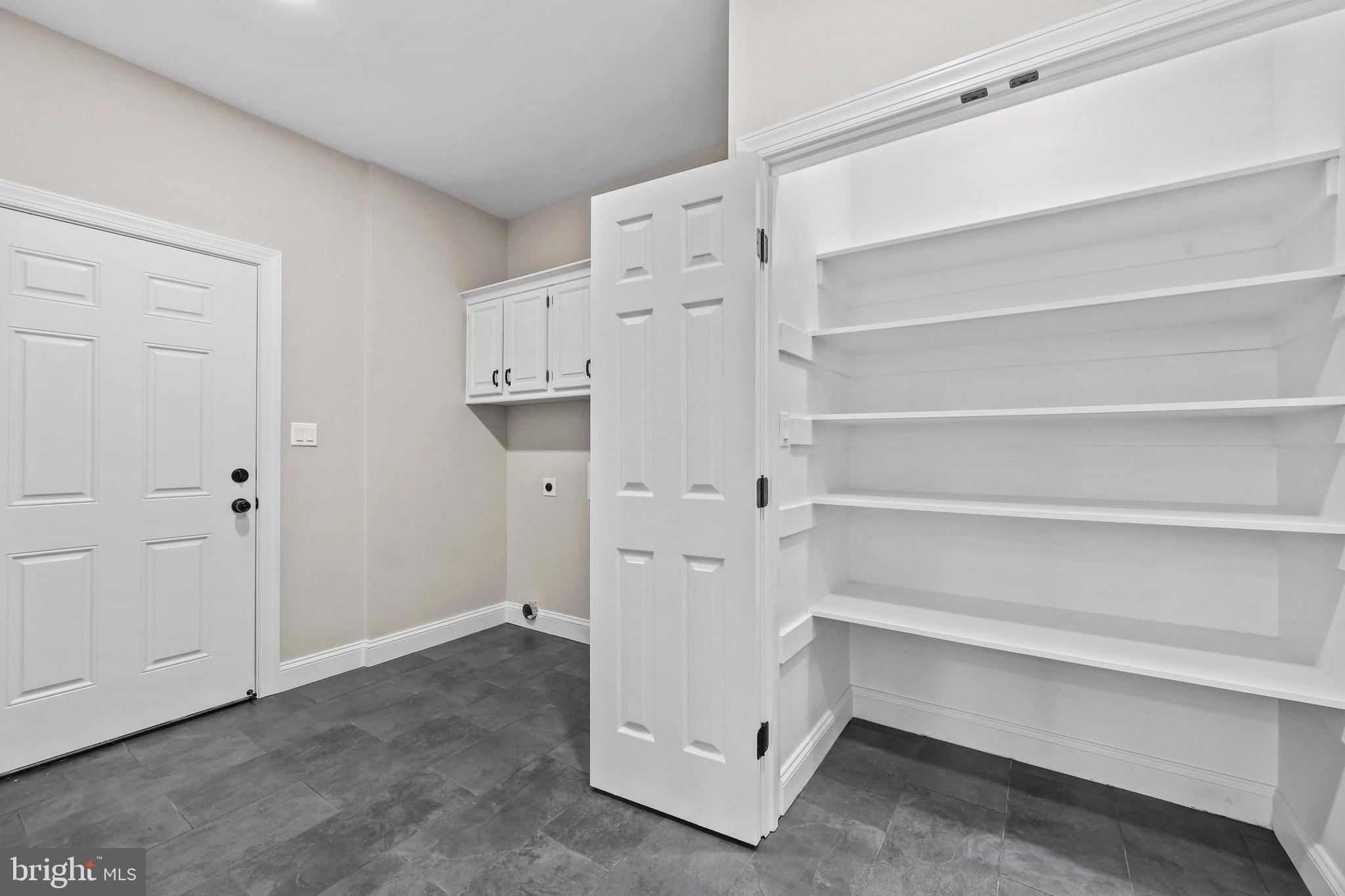5393 Merry Oaks Road The Plains, VA 20198 - Photo 22 of 58 a view of walk in closet with empty racks
