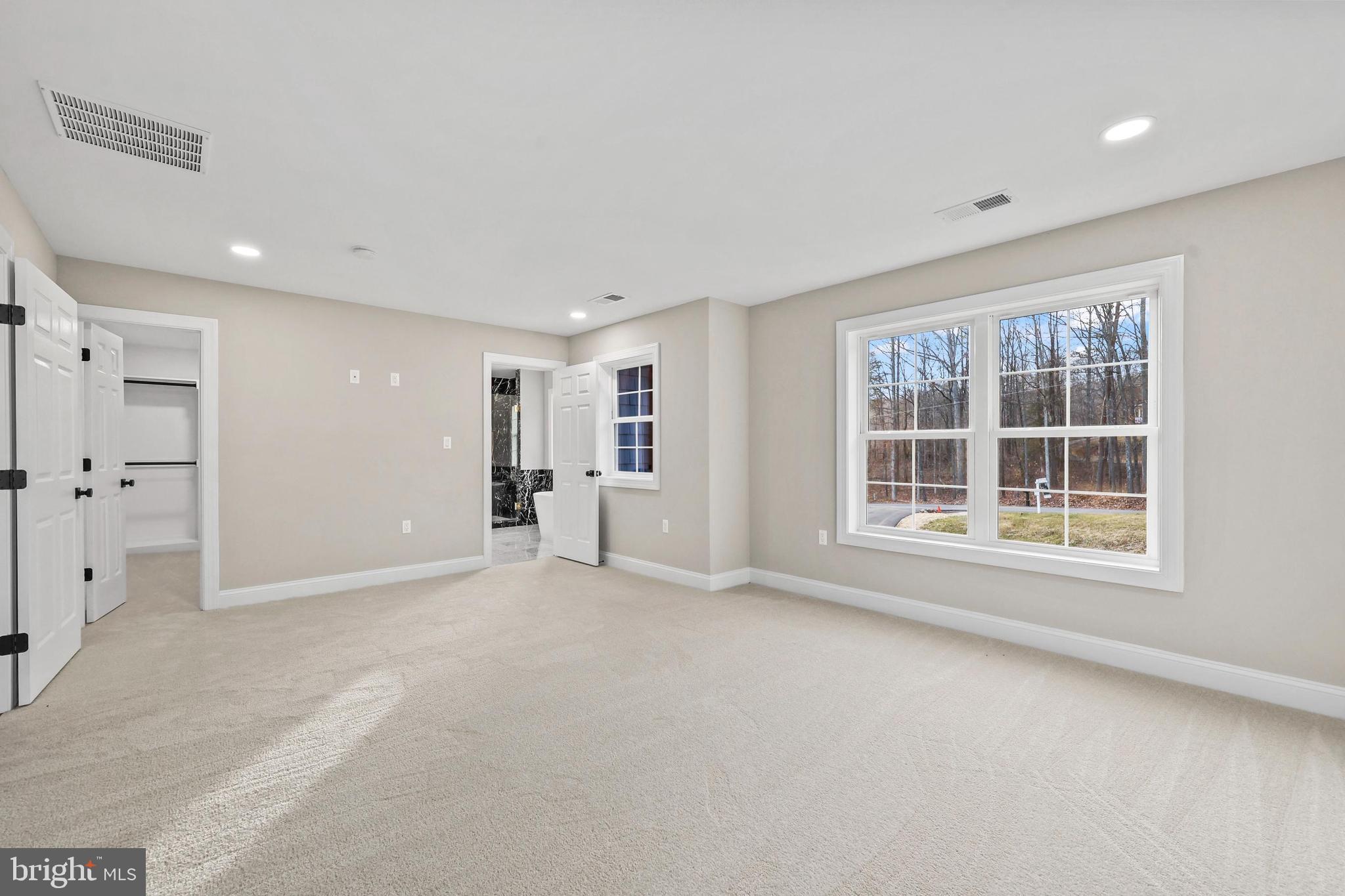 5393 Merry Oaks Road The Plains, VA 20198 - Photo 26 of 58 a view of an empty room with a window