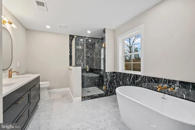 a bedroom with a bed and furniture