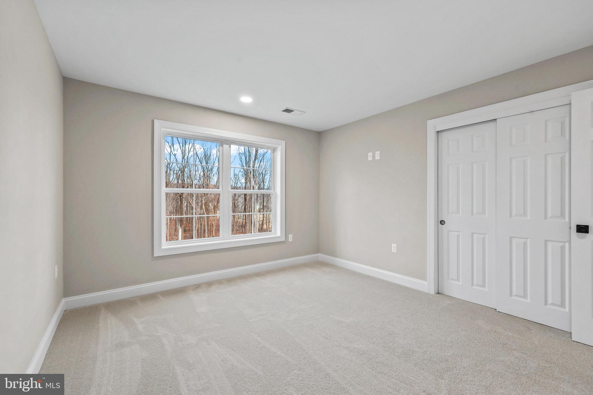 5393 Merry Oaks Road The Plains, VA 20198 - Photo 35 of 58 an empty room with a window