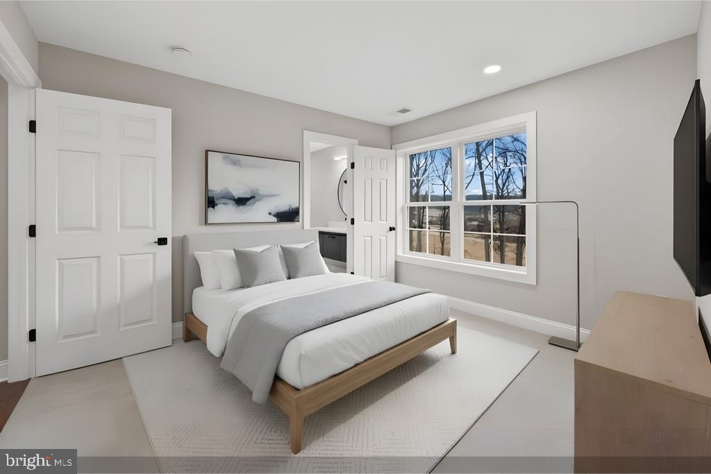 5393 Merry Oaks Road The Plains, VA 20198 - Photo 38 of 58 a spacious bedroom with a bed and a window