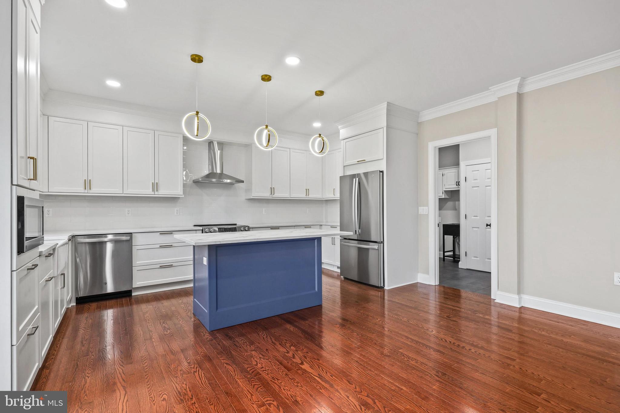 5393 Merry Oaks Road The Plains, VA 20198 - Photo 4 of 58 a kitchen with stainless steel appliances granite countertop a refrigerator and a stove top oven