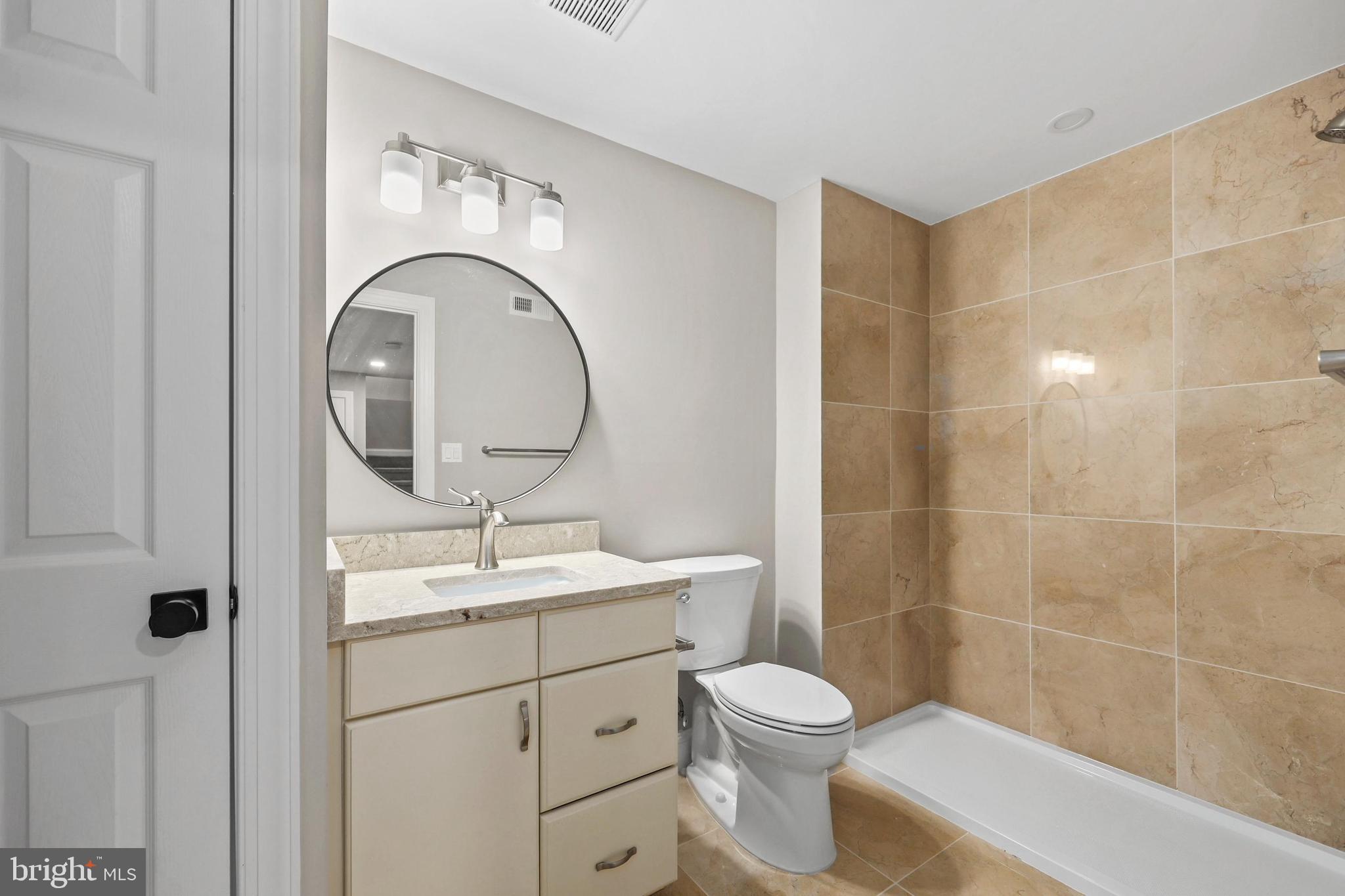 5393 Merry Oaks Road The Plains, VA 20198 - Photo 44 of 58 a bathroom with a sink toilet and a mirror