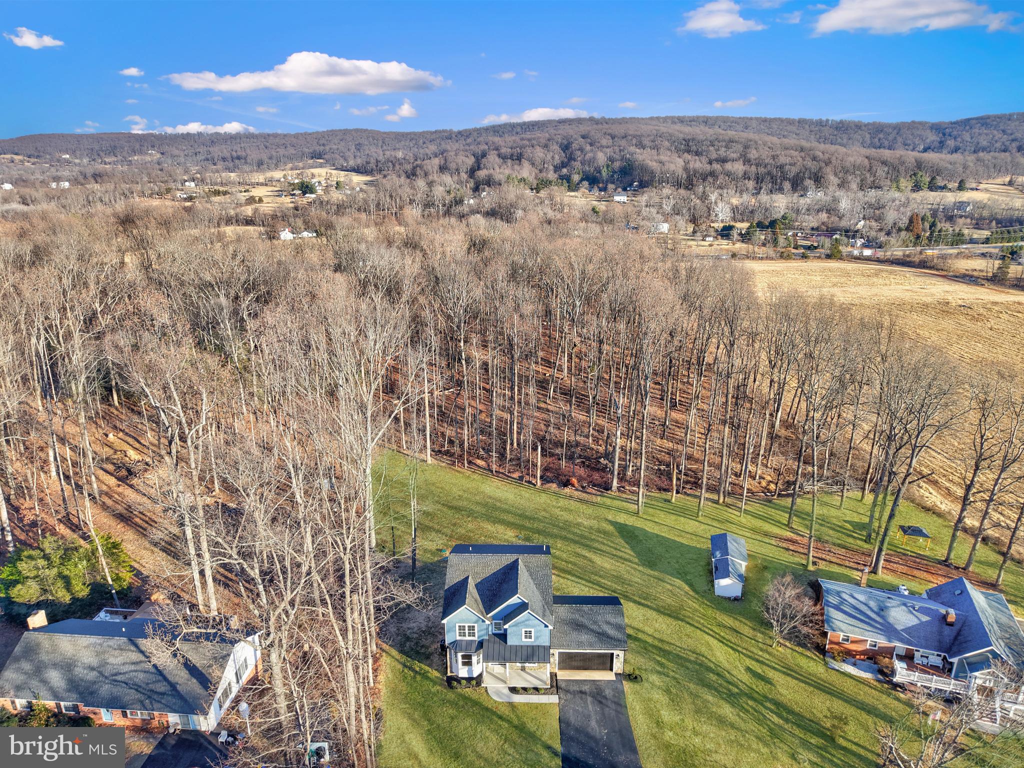 5393 Merry Oaks Road The Plains, VA 20198 - Photo 49 of 58 an aerial view of a houses with a lake view