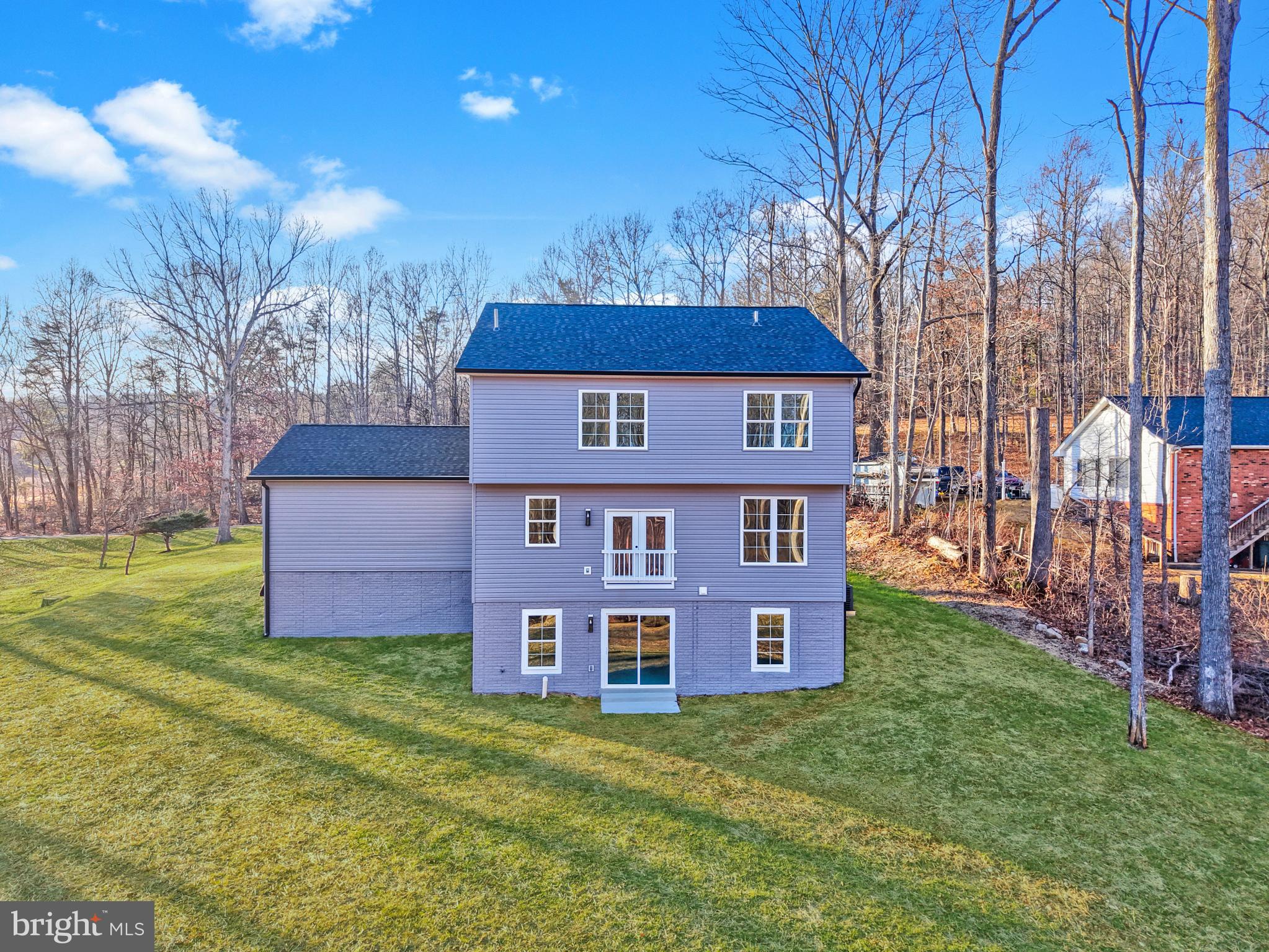5393 Merry Oaks Road The Plains, VA 20198 - Photo 51 of 58 a view of a big house with a big yard and large trees