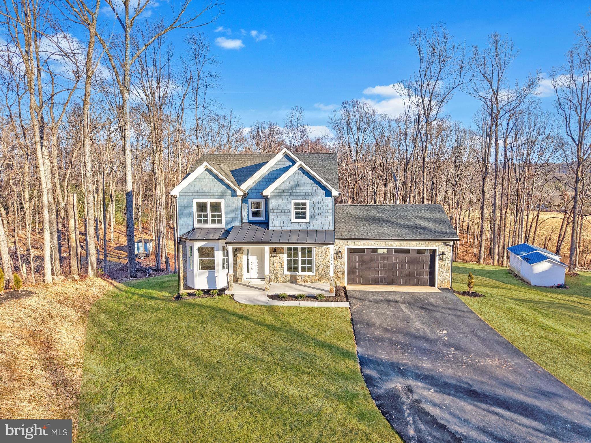 5393 Merry Oaks Road The Plains, VA 20198 - Photo 54 of 58 a view of a house with a yard and potted plants