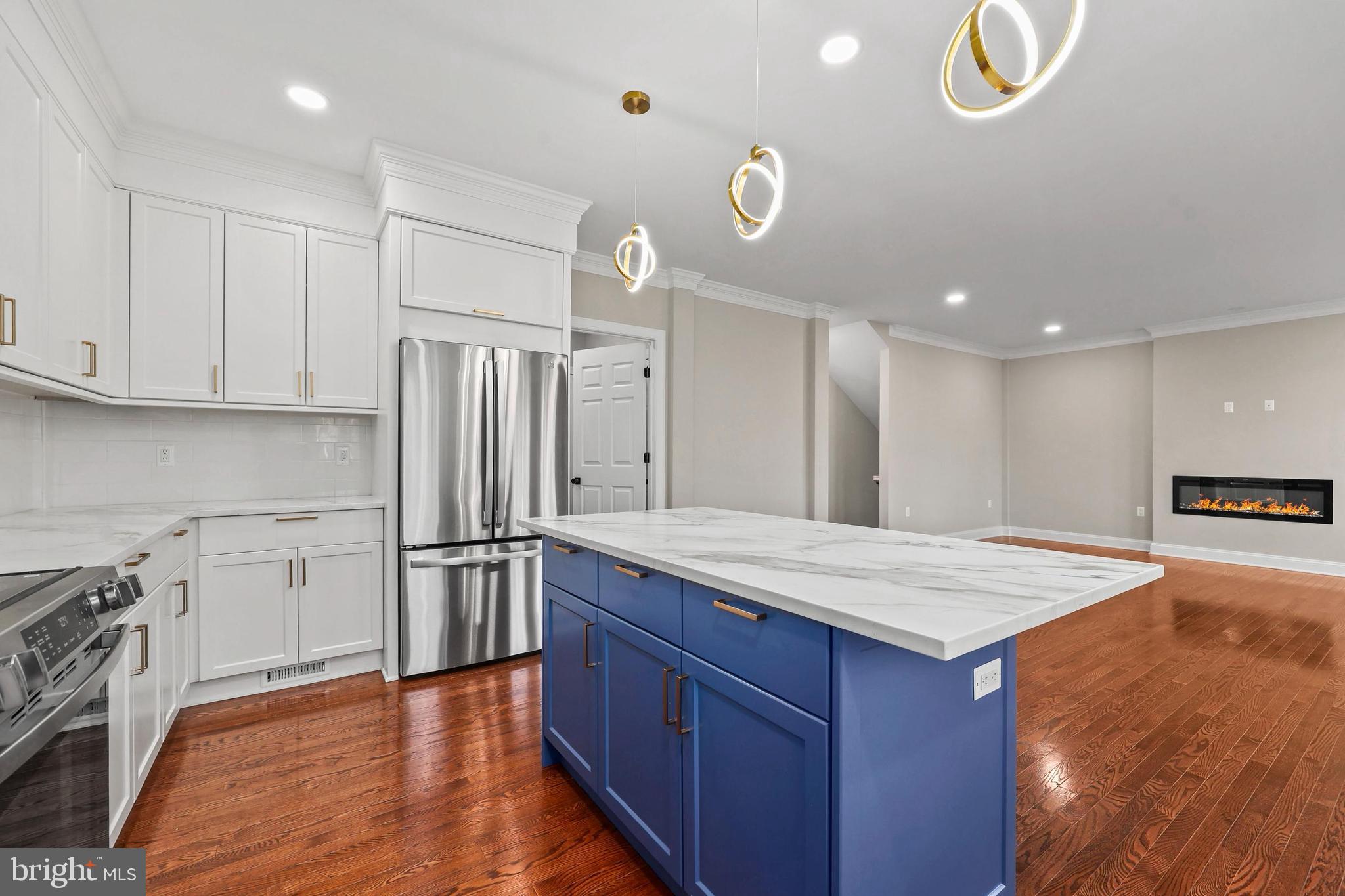 5393 Merry Oaks Road The Plains, VA 20198 - Photo 8 of 58 a kitchen with stainless steel appliances granite countertop a sink stove and refrigerator