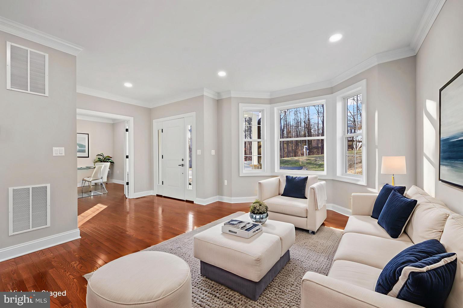 5393 Merry Oaks Road The Plains, VA 20198 - Photo 10 of 58 a living room with furniture and a large window