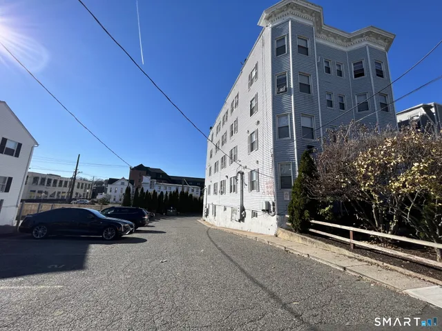 a view of roof with parking