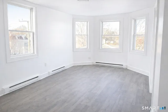 an empty room with windows