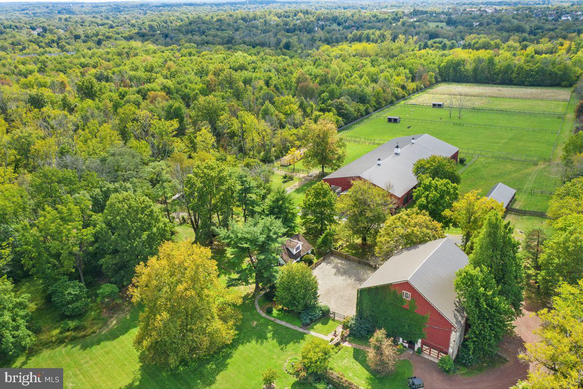 720 Swedesford Road Lower Gwynedd, PA 19002 - Photo 6 of 79 an aerial view of a residential houses with outdoor space and trees all around