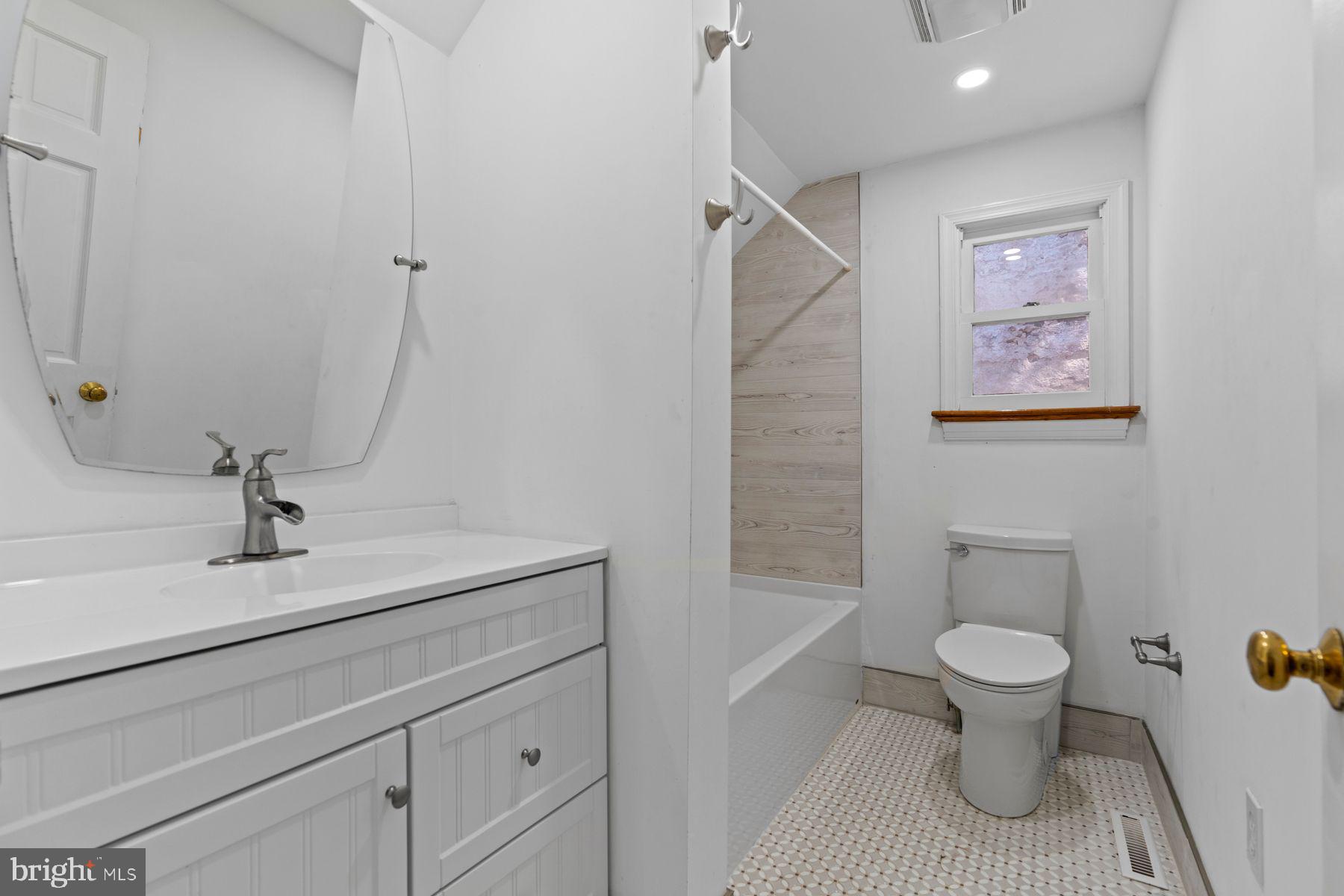 720 Swedesford Road Lower Gwynedd, PA 19002 - Photo 76 of 79 a bathroom with a sink a toilet and a mirror