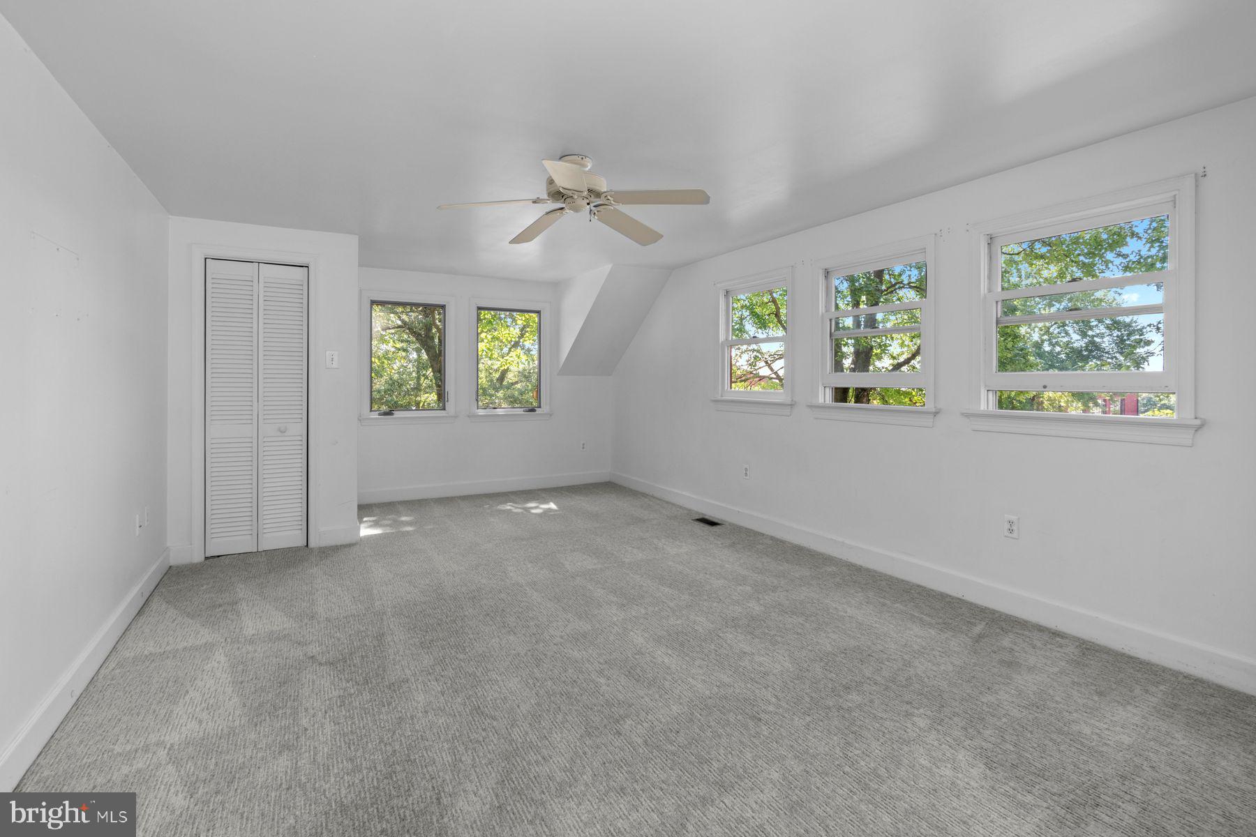 720 Swedesford Road Lower Gwynedd, PA 19002 - Photo 78 of 79 an empty room with windows ceiling fan and windows