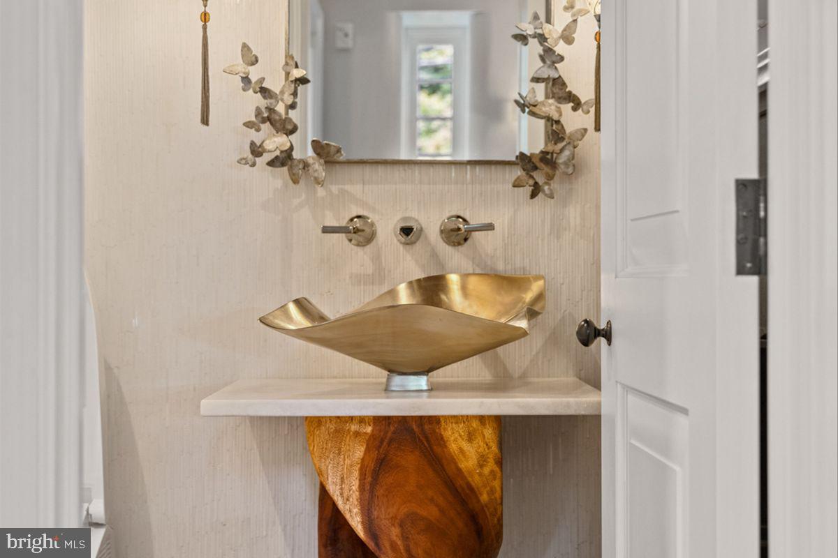 720 Swedesford Road Lower Gwynedd, PA 19002 - Photo 9 of 79 a bathroom with a sink and mirror