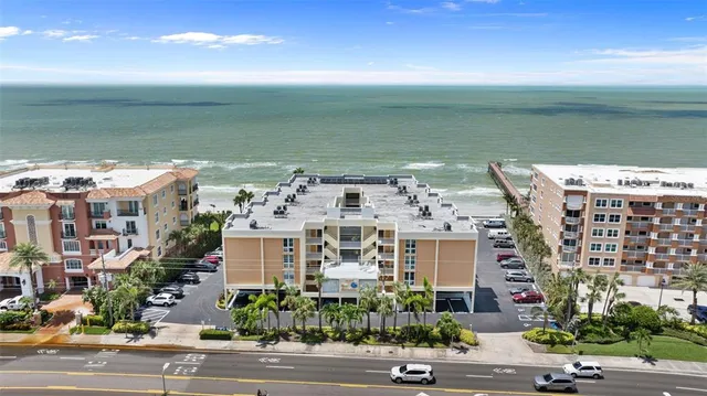 a front view of building with yard