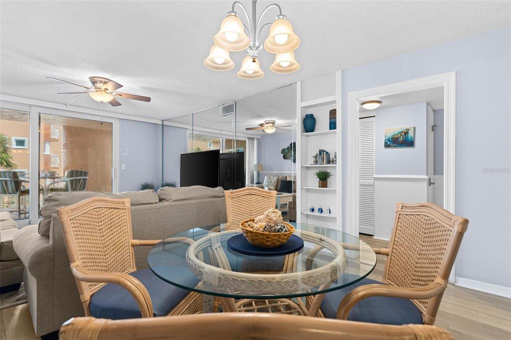 16308 Gulf Boulevard, Unit 209 Redington Beach, FL 33708 - Photo 13 of 54 a living room with furniture and a flat screen tv