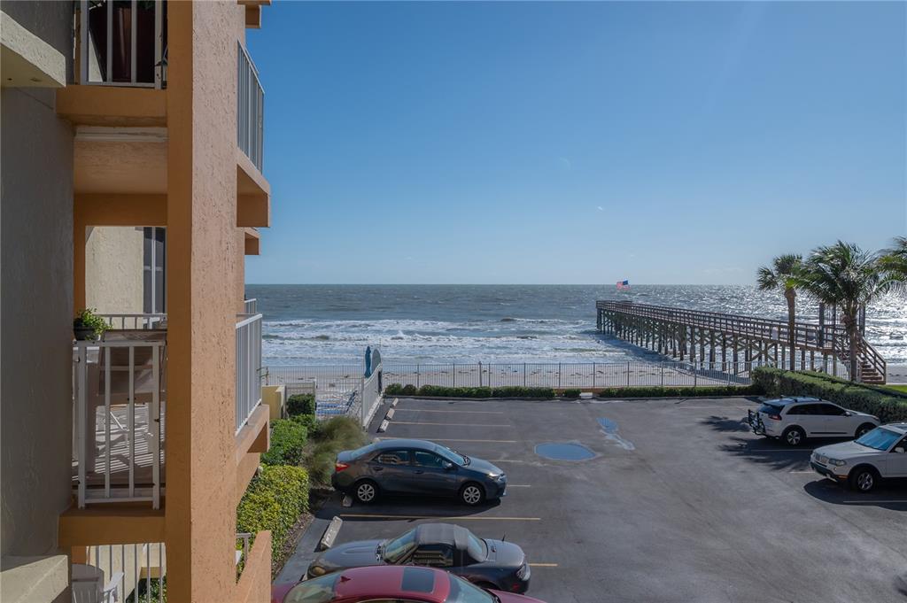 16308 Gulf Boulevard, Unit 209 Redington Beach, FL 33708 - Photo 29 of 54 a view of a car park in front of a building