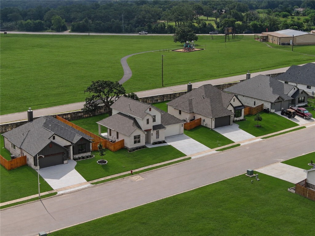 162 Buffalo Rdg Road Giddings, TX 78942 - Photo 26 of 31 an aerial view of a house