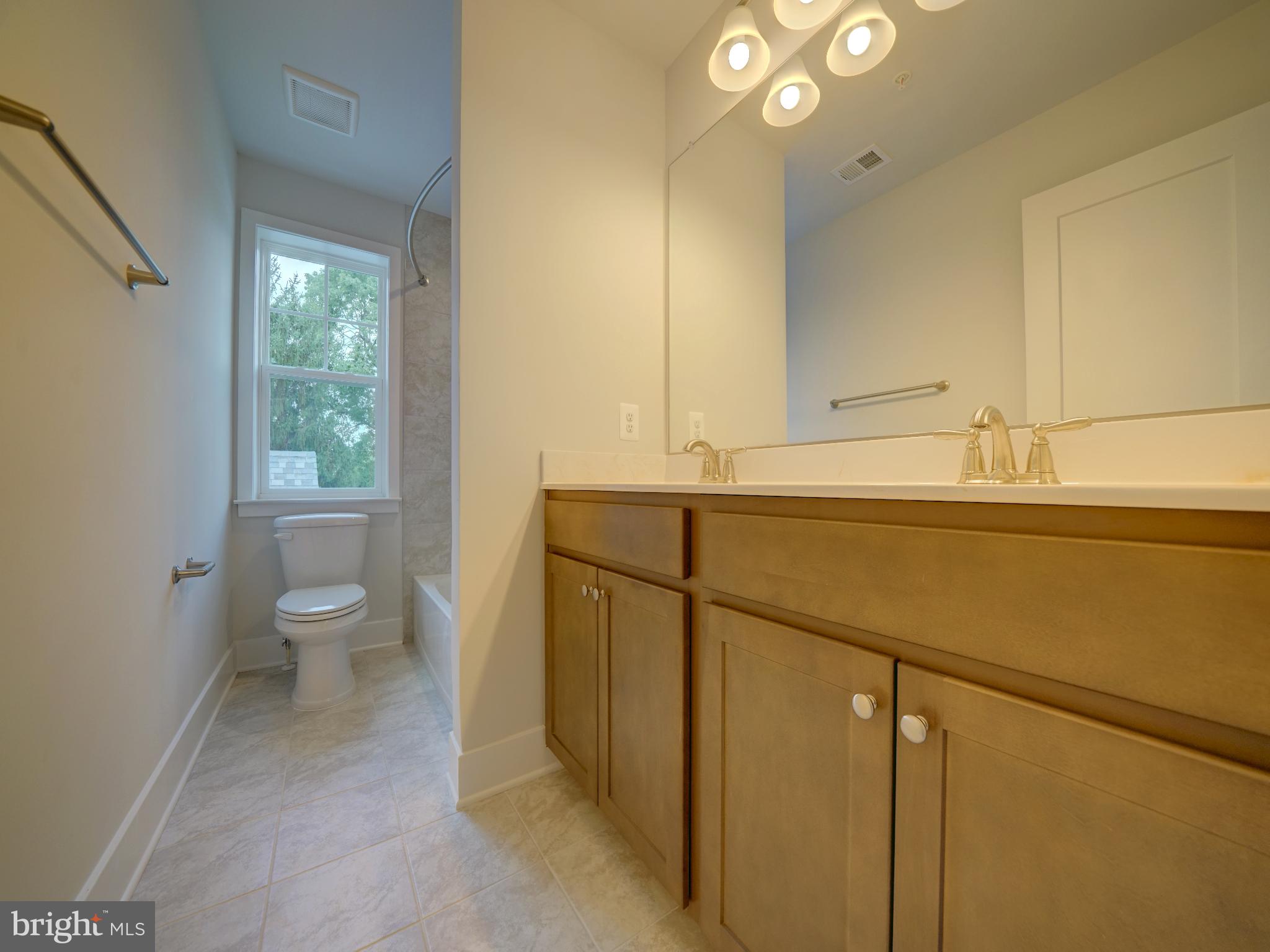 9324 Meredith Avenue Laurel, MD 20723 - Photo 34 of 59 Hall full bath with double vanity