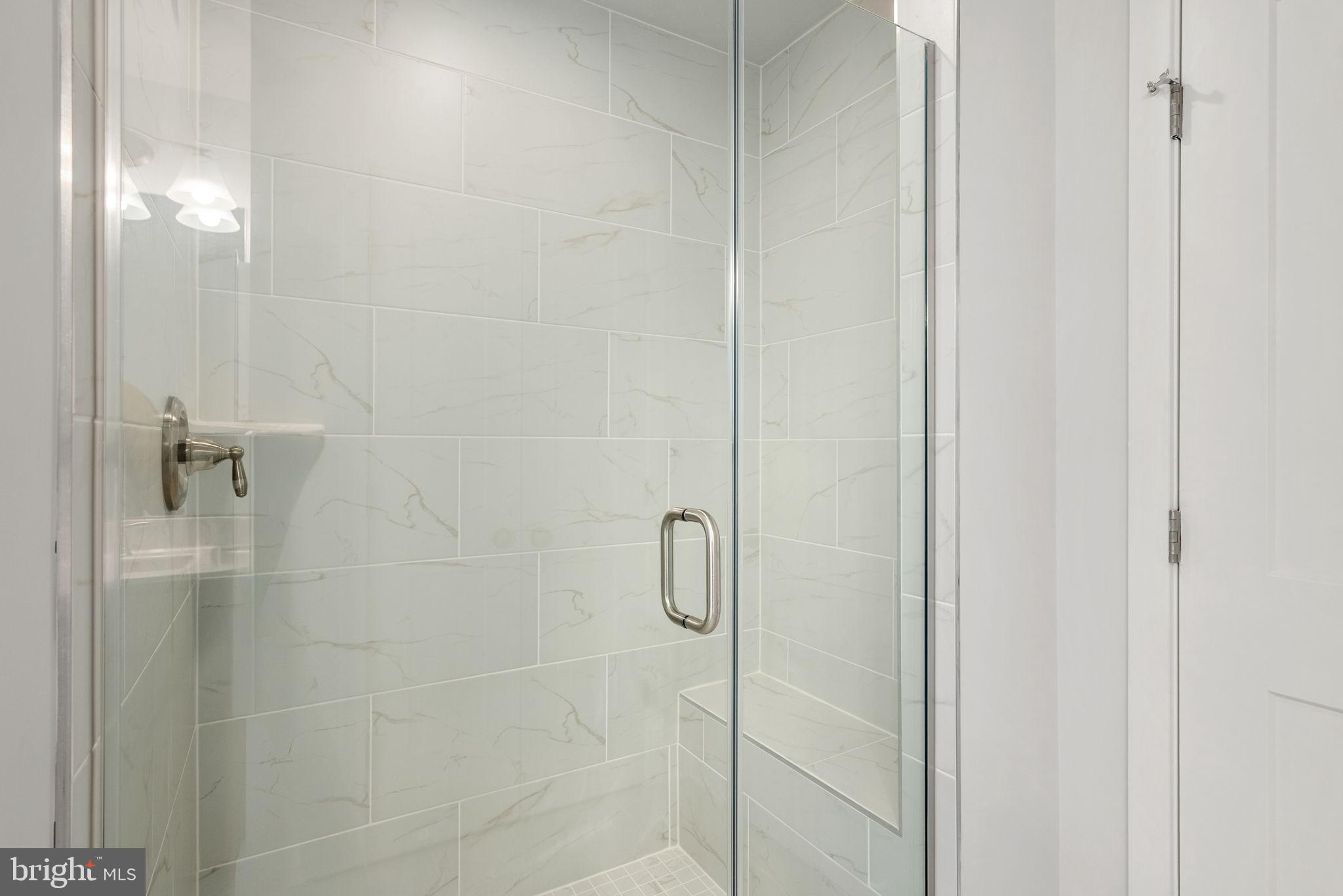 9324 Meredith Avenue Laurel, MD 20723 - Photo 46 of 59 Tiled shower with glass doors