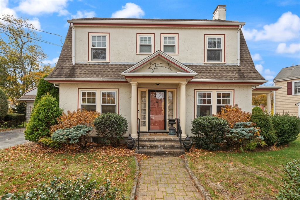 177 Nevada Street Newton, MA 02460 - Photo 1 of 40 a front view of a house with garden