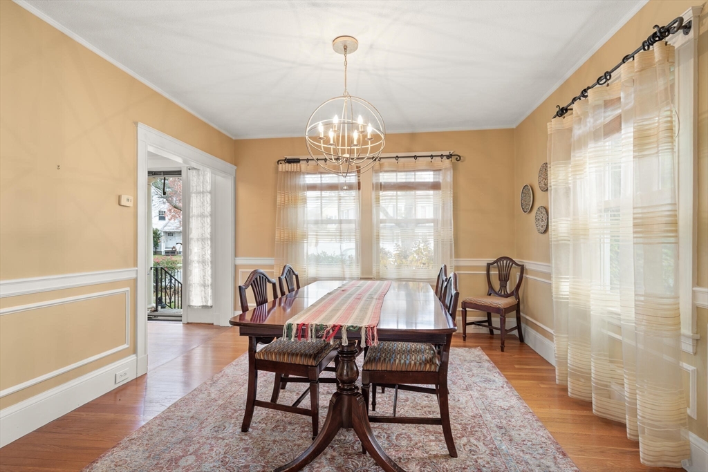 177 Nevada Street Newton, MA 02460 - Photo 17 of 40 a view of a dining room with furniture window and outside view