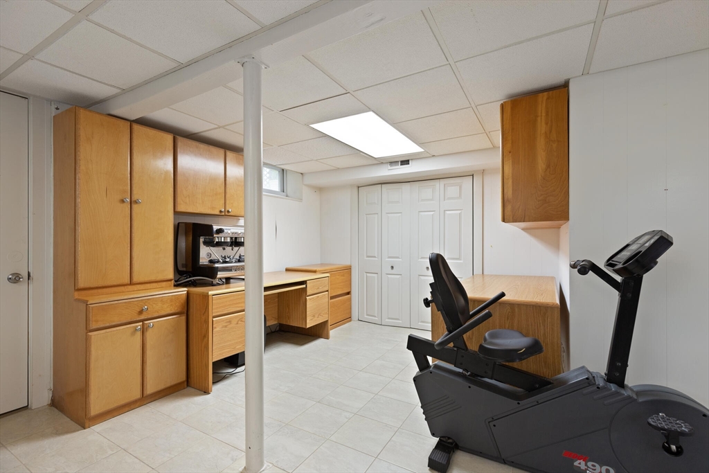 177 Nevada Street Newton, MA 02460 - Photo 24 of 40 a view of a room with gym equipment