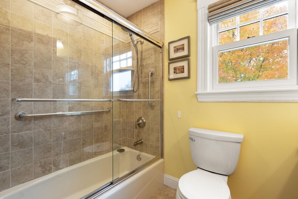 177 Nevada Street Newton, MA 02460 - Photo 34 of 40 a bathroom with a toilet and a shower