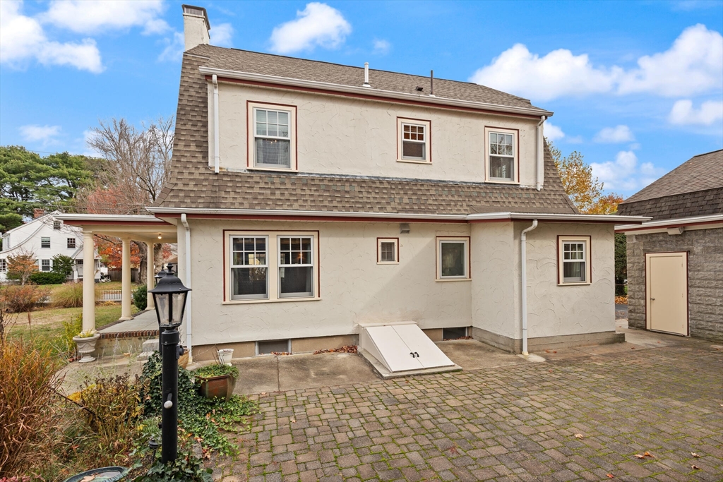 177 Nevada Street Newton, MA 02460 - Photo 38 of 40 a view of a house with a yard