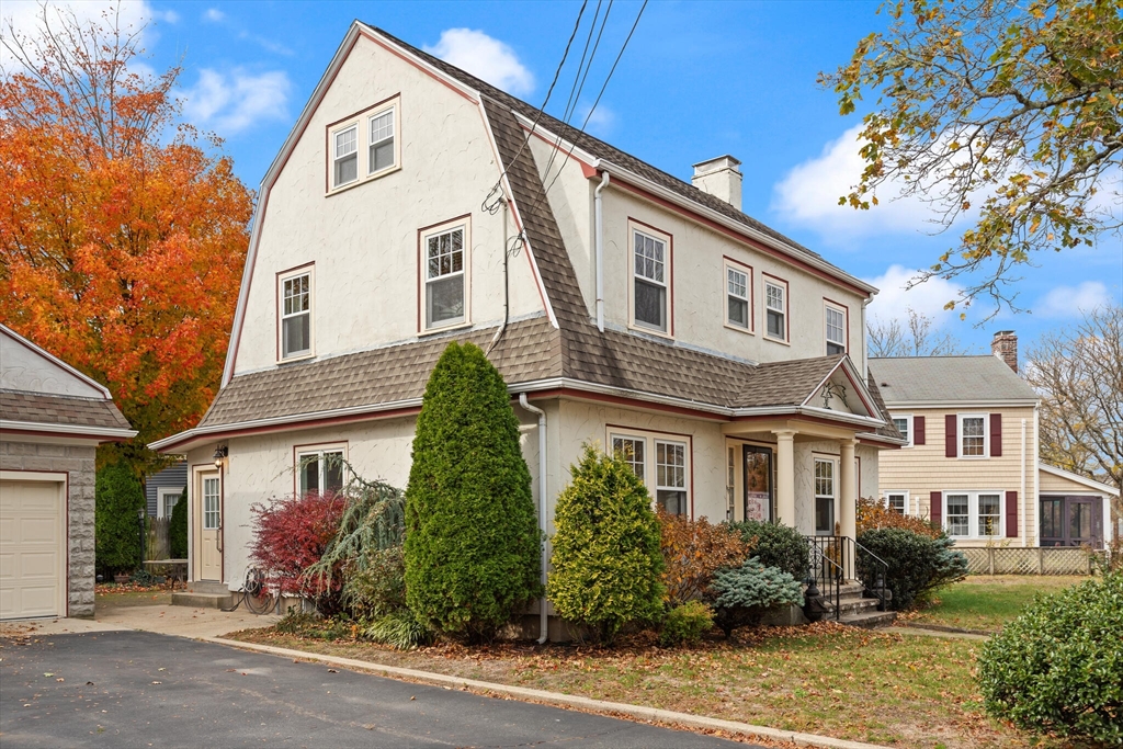 177 Nevada Street Newton, MA 02460 - Photo 5 of 40 a front view of a house with garden