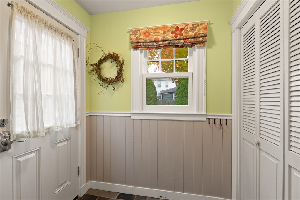 177 Nevada Street Newton, MA 02460 - Photo 7 of 40 a view of a door and a window